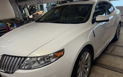 White Sedan in Garage